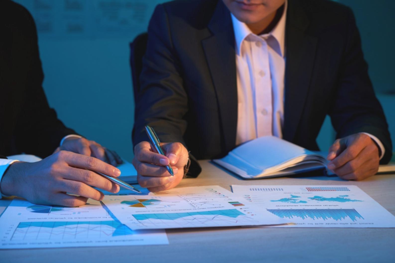 AdvanceXNeo office workspace with financial analysis tools